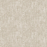 Painterly small-scale dashed dot print in white on a soft taupe watercolor field.