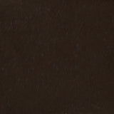 Detail of velvet fabric yardage in dark brown.