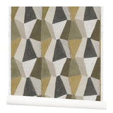 Wallpaper roll with mixed three dimensional diamond forms with black, white, taupe, dark forest green, dark sage green and a bright olive green on a textured paper.