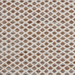 Handwoven rug with small scale diamond lattice in cream on a tan and brown field. 