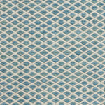 Handwoven rug with small scale diamond lattice in cream on a tan and marine blue field. 