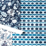 Three sheets of patterned wallpaper displayed in a flat-lay arrangement. At left two blue and white floral designs, at right a graphic basketweave plaid also in blue. 