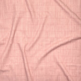 Close up of gently draped printed linen with thin hand drawn stripe grid in tonal pink.