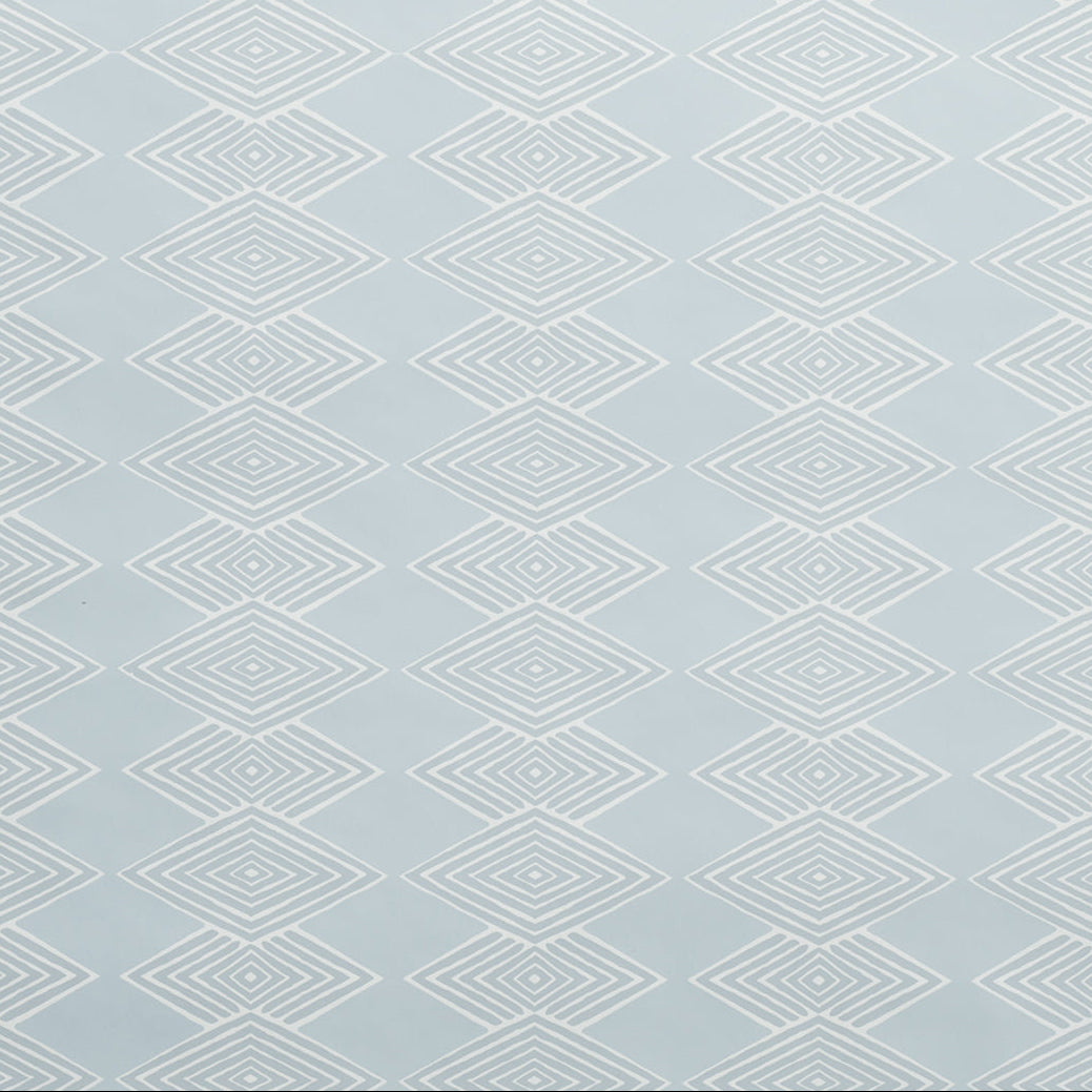 Close up of wallpaper with linear stacked diamond stripe in pale blue.