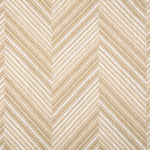 Broadloom carpet with a graphic herringbone pattern in shades of tan and white. 