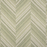 Broadloom carpet with a graphic herringbone pattern in shades of pastel green and white. 
