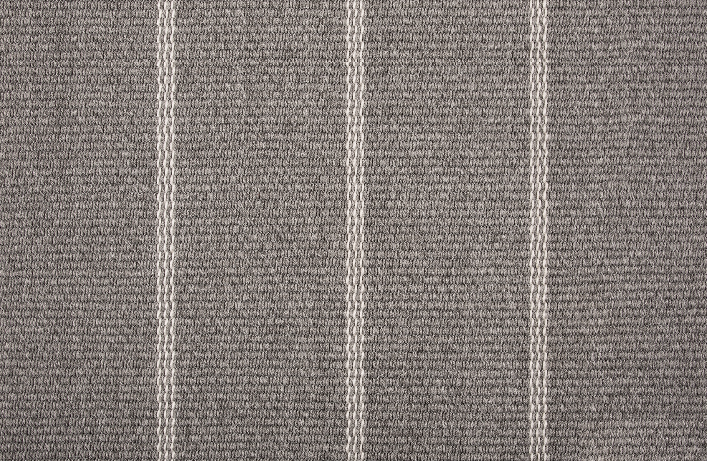 Broadloom carpet in grey with a white widely placed pinstripe