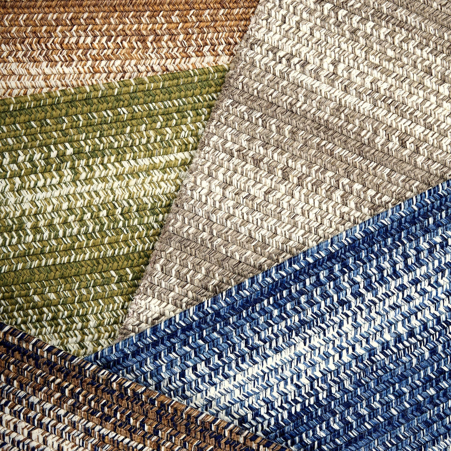Broadloom carpet swatches in textural braid pattern in various colors. 