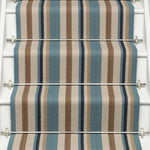 Striped flatweave runner in blue tan cream and black on white staircase