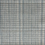 Broadloom carpet in a cream and blue.