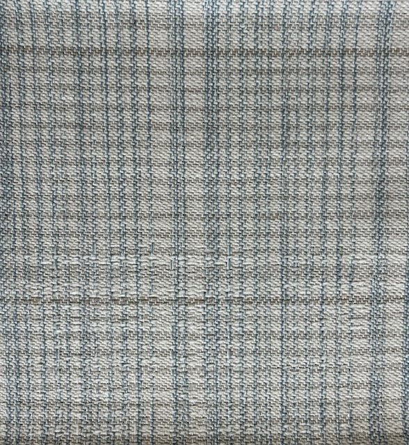 Broadloom carpet in a cream and blue.