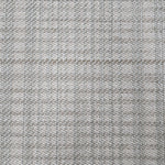 Broadloom carpet in a cream and grey.