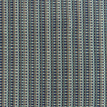 Detail of a hand-woven cotton fabric in an intricate grid pattern in shades of navy, brown, teal and white.