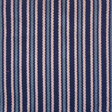 Detail of a hand-woven cotton fabric in a stripe pattern in shades of purple, pink and blue.