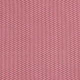 Detail of a hand-woven cotton fabric in a grid pattern in pink and brown.