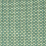 Detail of a hand-woven cotton fabric in a grid pattern in sage and teal.