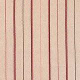 Detail of a hand-woven cotton striped fabric in cream brown, red and pink.