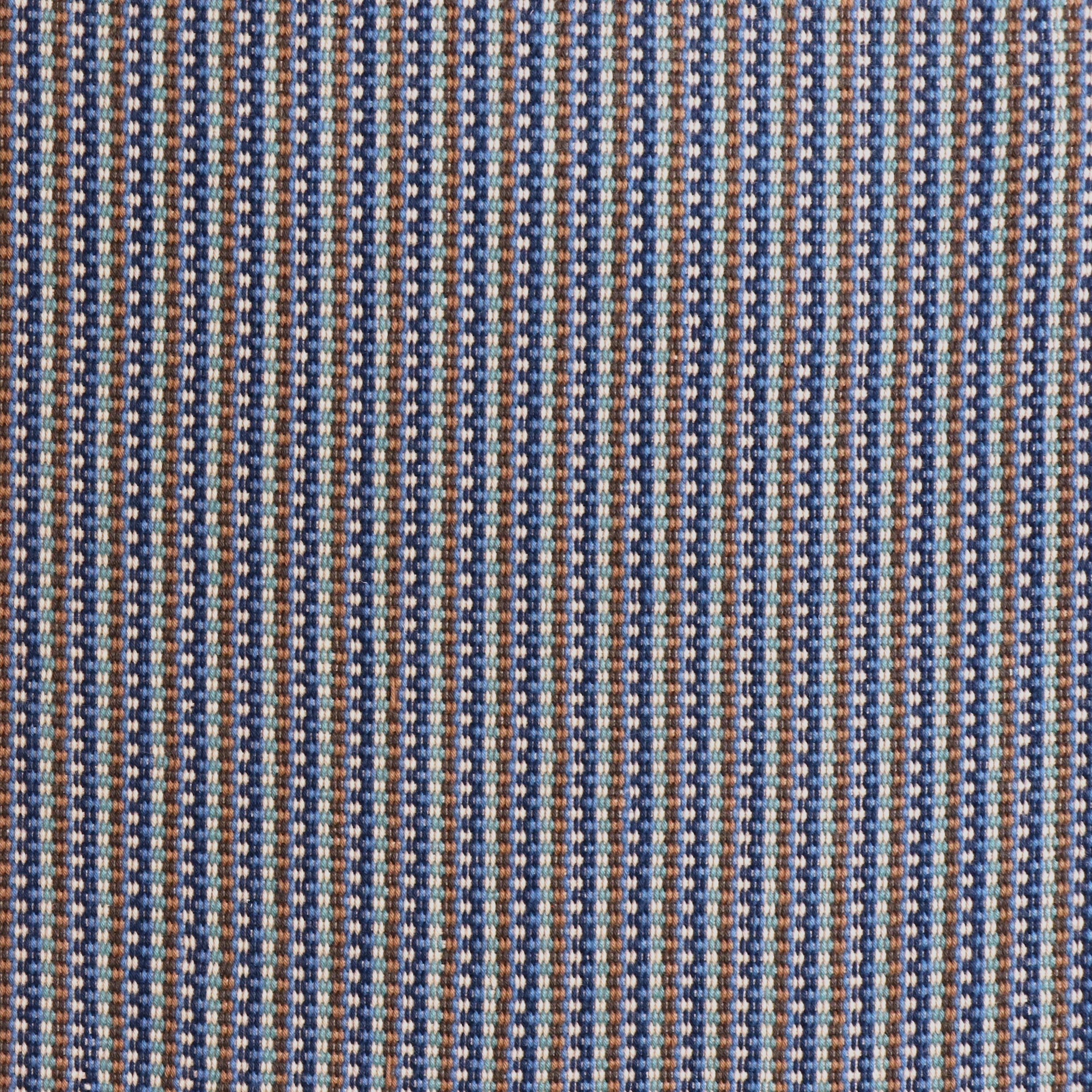 Detail of a hand-woven cotton fabric in an intricate grid pattern in shades of blue, tan, teal and white.