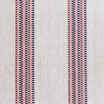 Detail of a hand-woven cotton fabric in an irregular stripe pattern in navy, red and pink on a white field.
