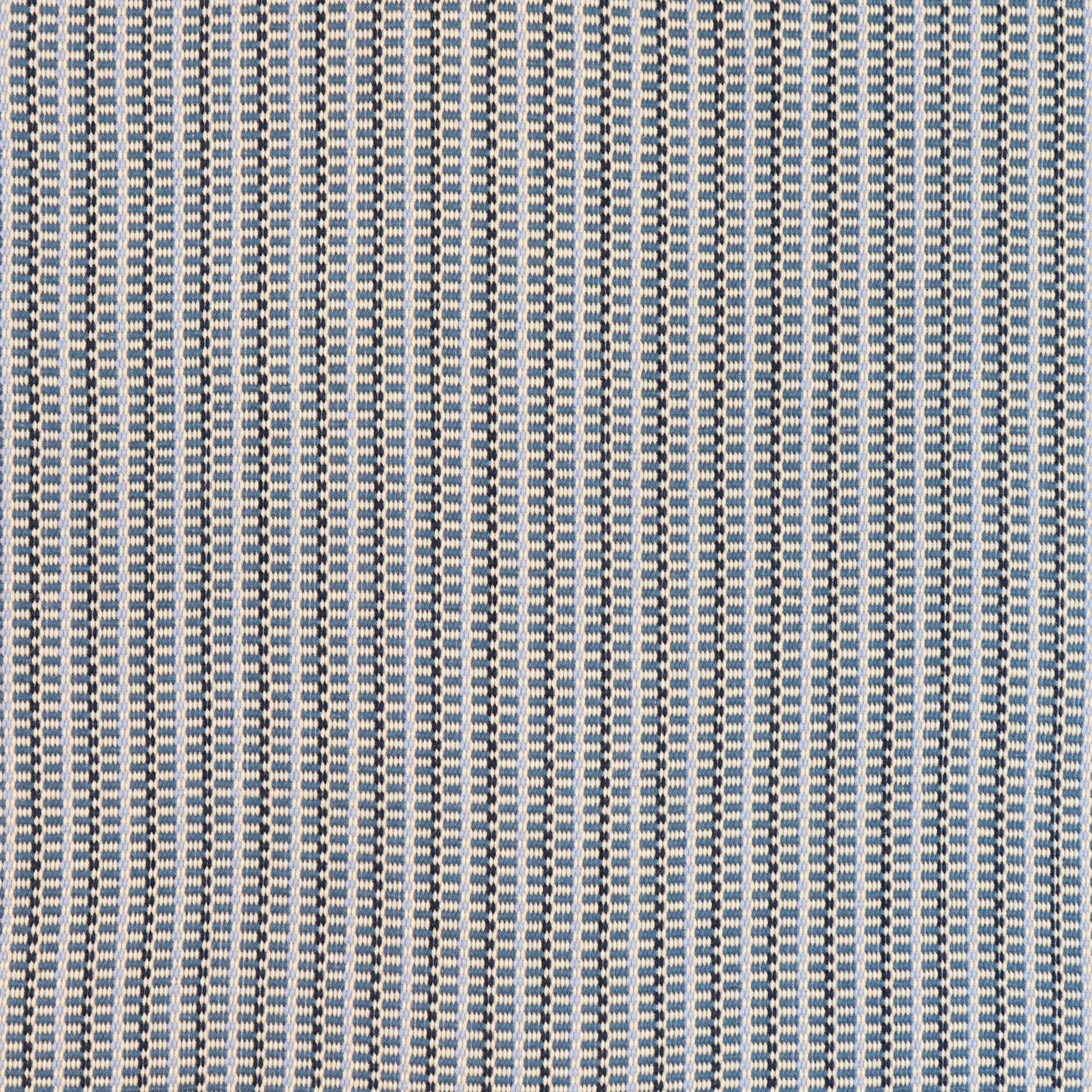 Detail of a hand-woven cotton striped fabric in blue, cream and navy.