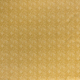 Printed linen fabric in a repeating chrysanthemum pattern in white on a mustard field.