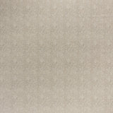 Printed linen fabric in a repeating chrysanthemum pattern in white on a cream field.