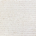 Broadloom carpet in a lightly ribbed cut pile in white