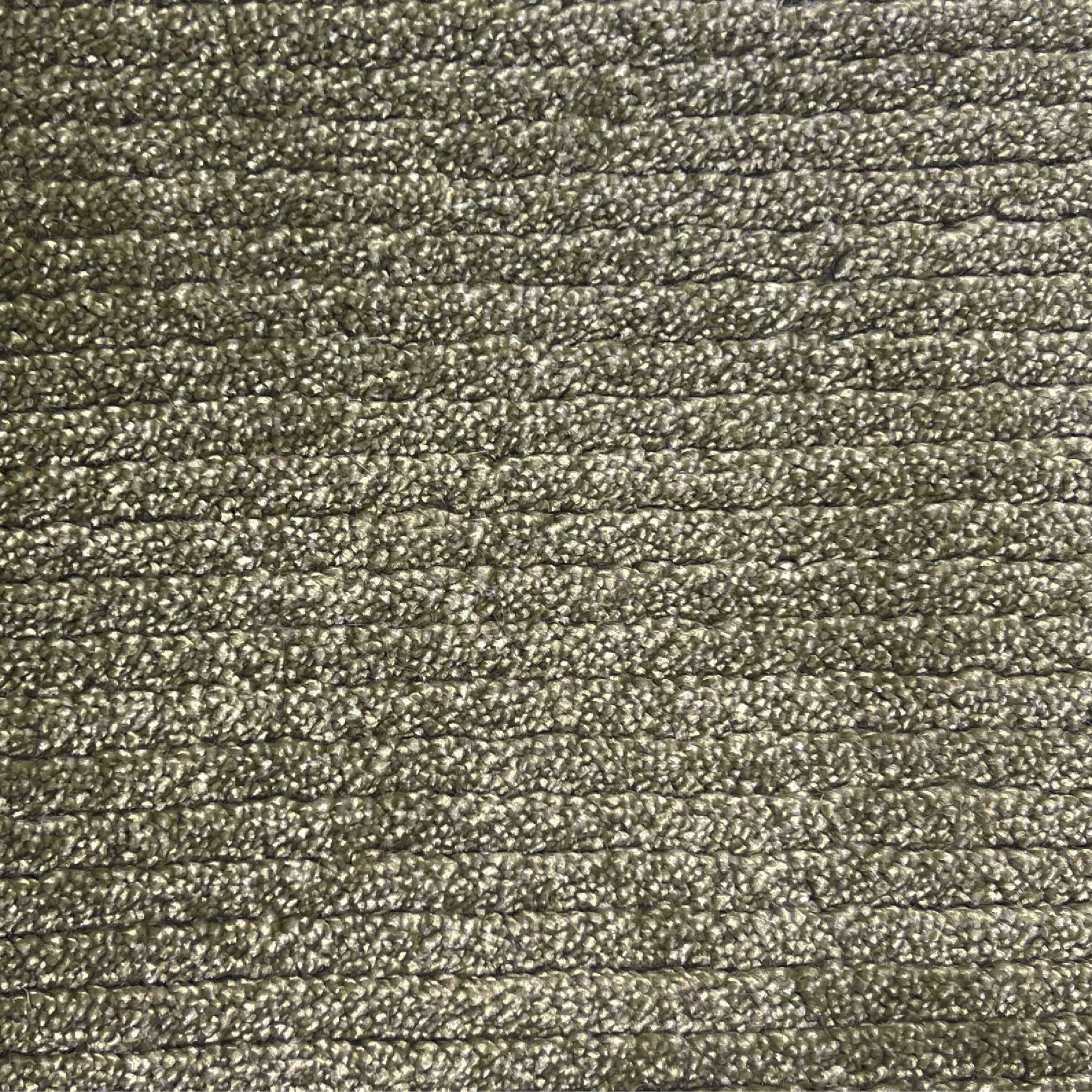 Broadloom carpet in a lightly ribbed cut pile in mossy green