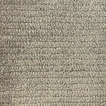 Broadloom carpet in a lightly ribbed cut pile in warm taupe. 