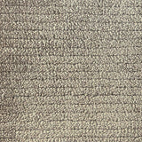 Broadloom carpet in a lightly ribbed cut pile in warm taupe. 