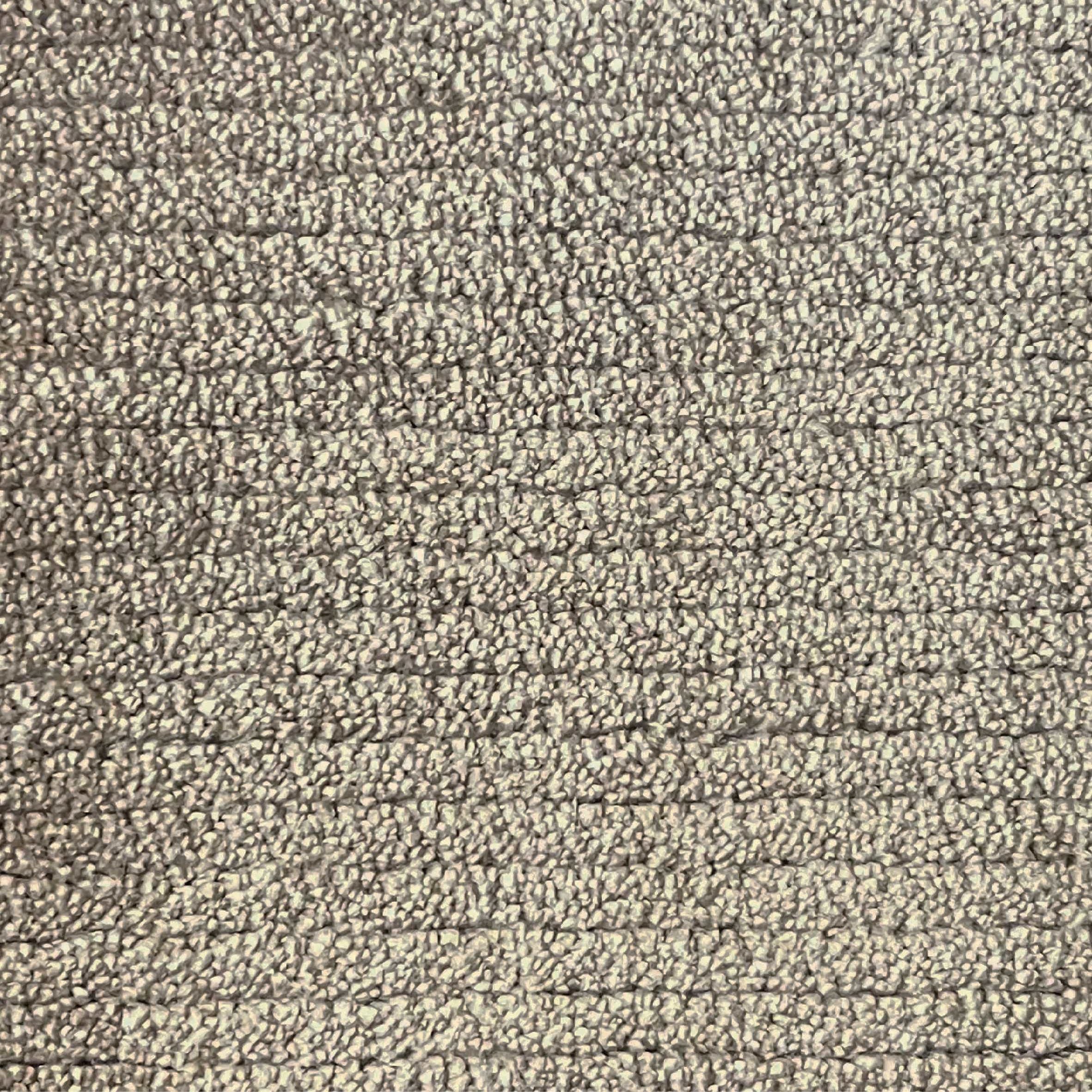Broadloom carpet in a lightly ribbed cut pile in warm taupe. 