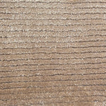 Broadloom carpet in a lightly ribbed cut pile in warm beige. 