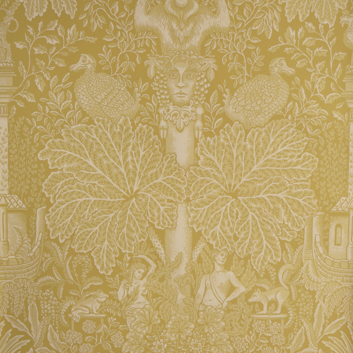 Decorative wallpaper with classical design elements on a gold background