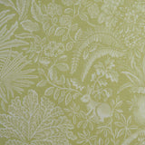 Green fabric with white floral and leaf pattern
