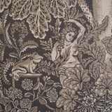 Decorative fabric with a woman and frog design on a brown background