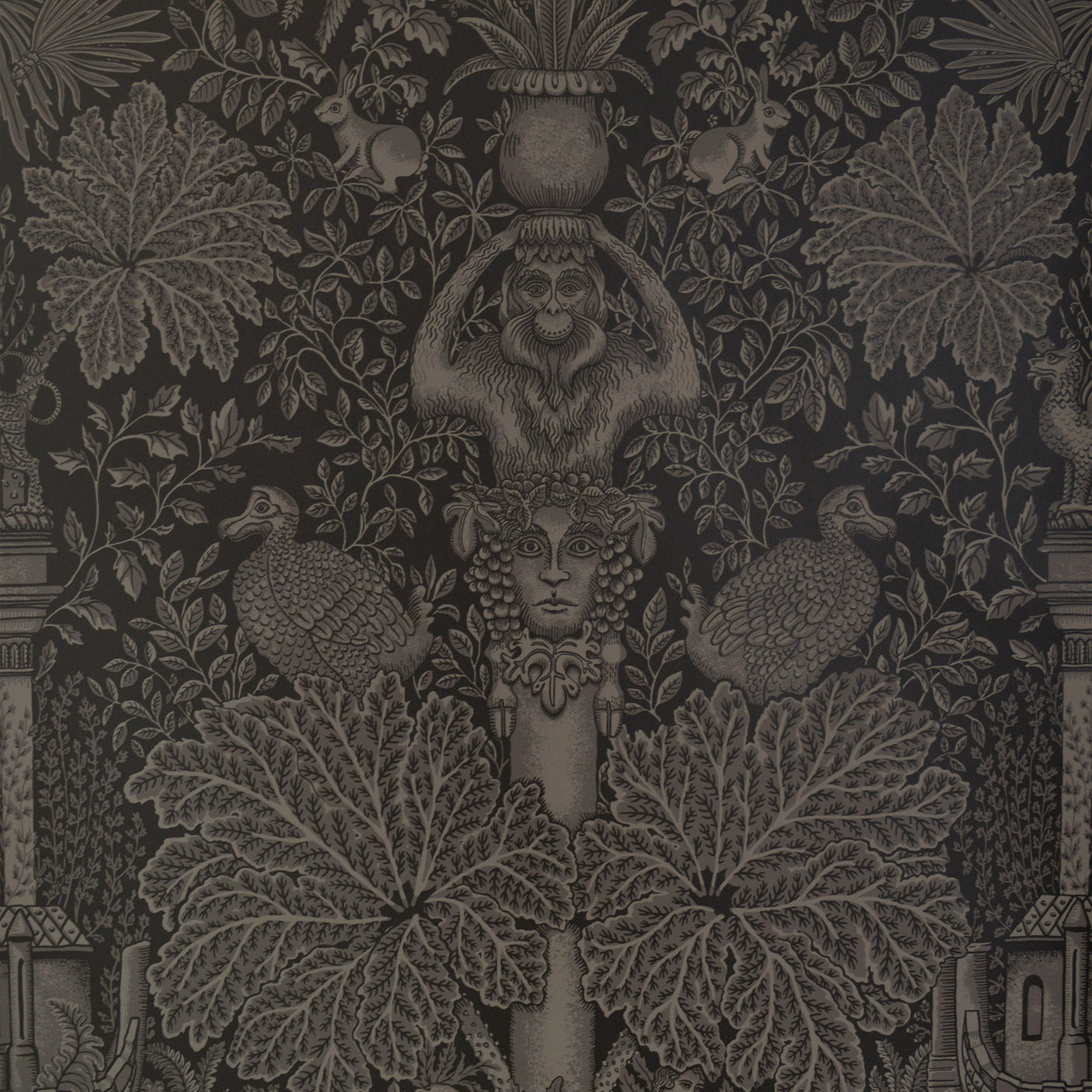 Decorative fabric pattern with intricate designs on a dark background