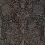 Decorative fabric pattern with intricate designs on a dark background