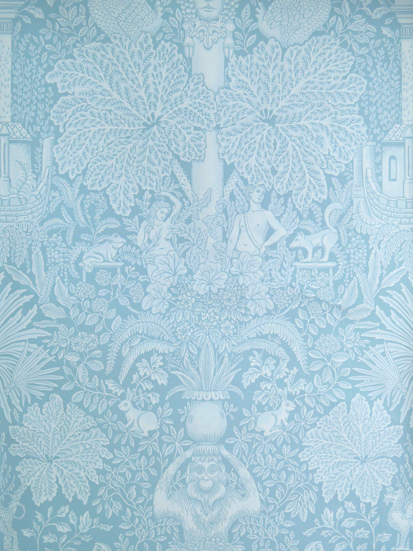 Decorative wallpaper with a floral pattern in light blue tones
