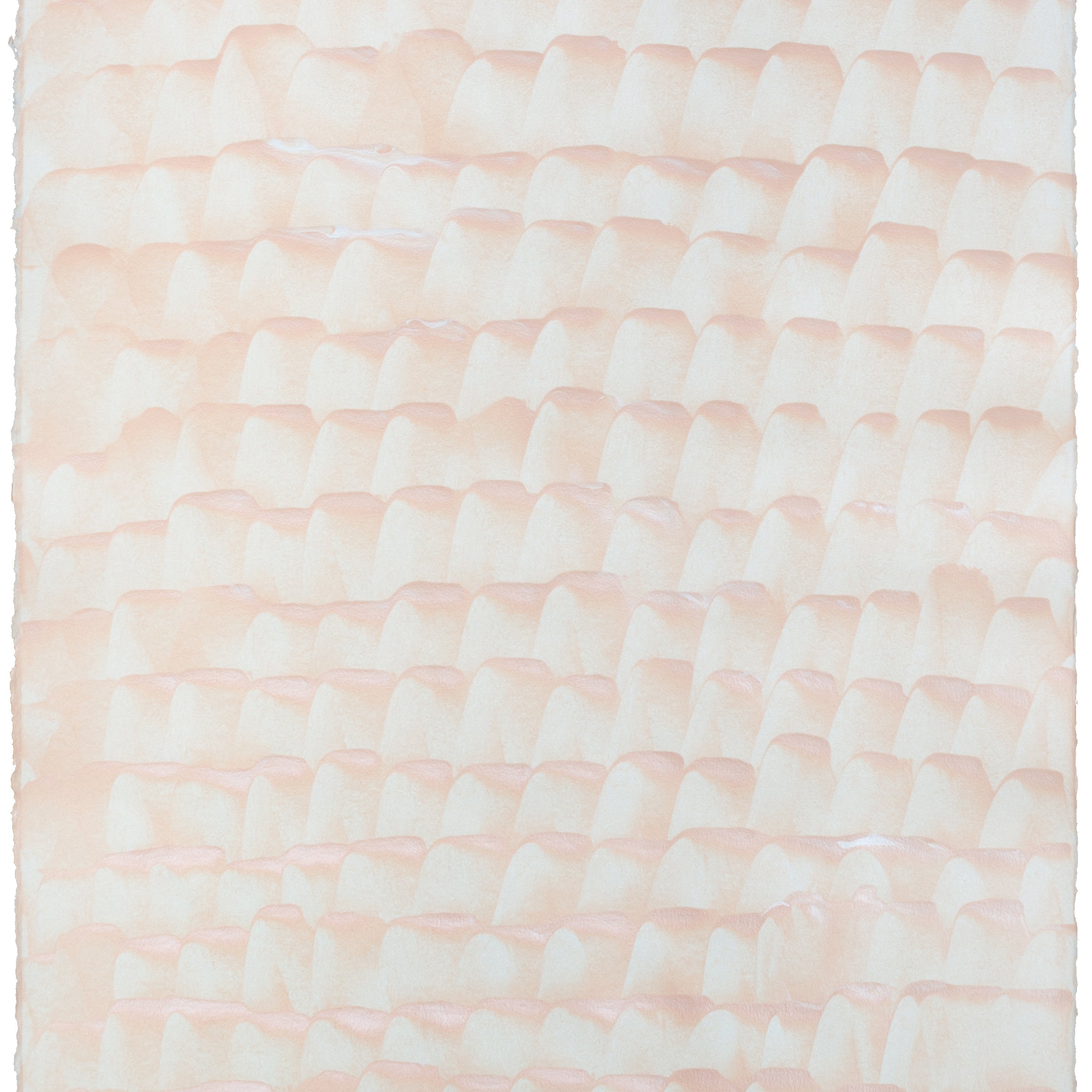 Sheet of hand-painted wallpaper with a repeating dappled texture in light pink.