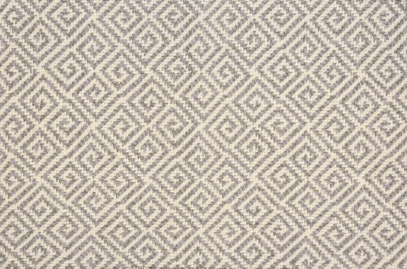 Broadloom carpet swatch in a geometric pattern in a grey white design