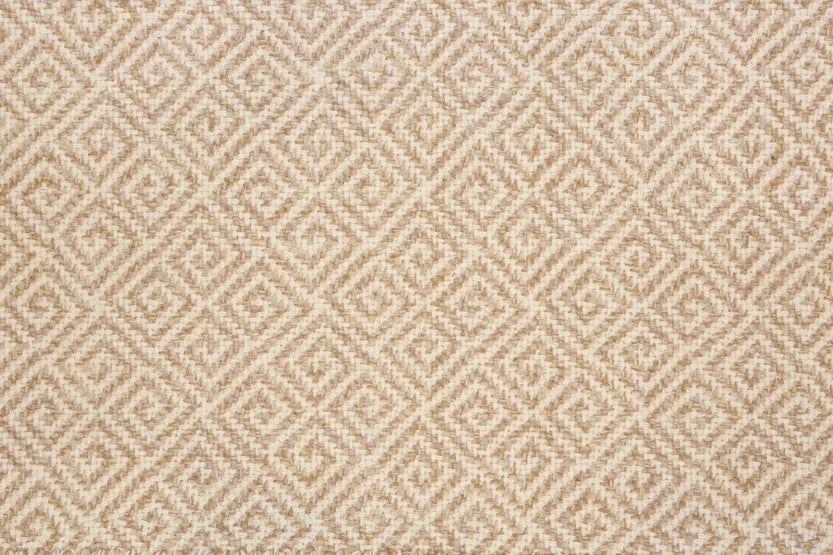 Broadloom carpet swatch in a geometric pattern in a tan white design