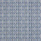 Patterned carpet with a geometric design in blue and white