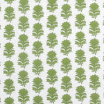 Detail of fabric in a repeating thistle print in green on a white field.