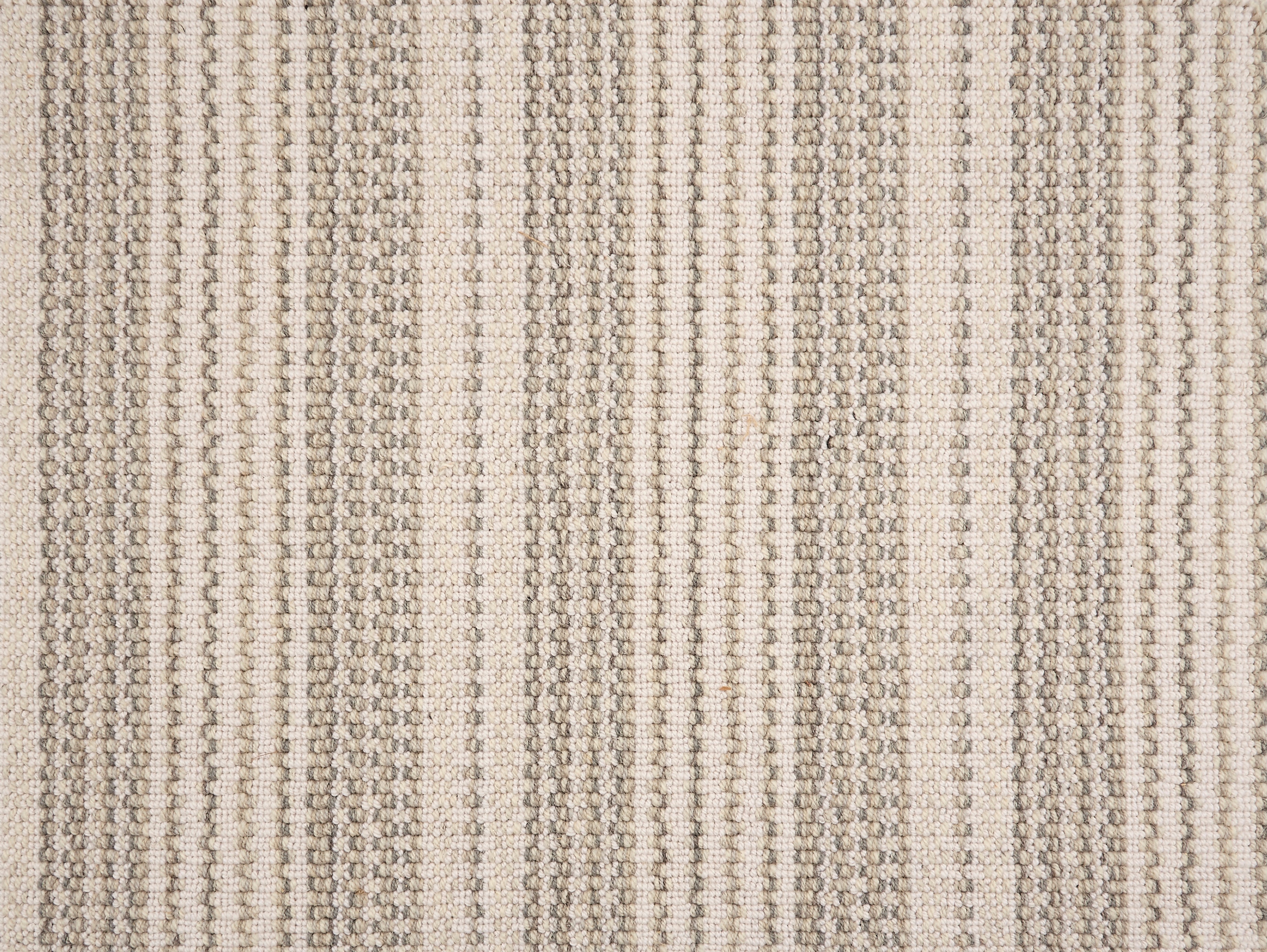 Broadloom carpet with grey and beige stripes