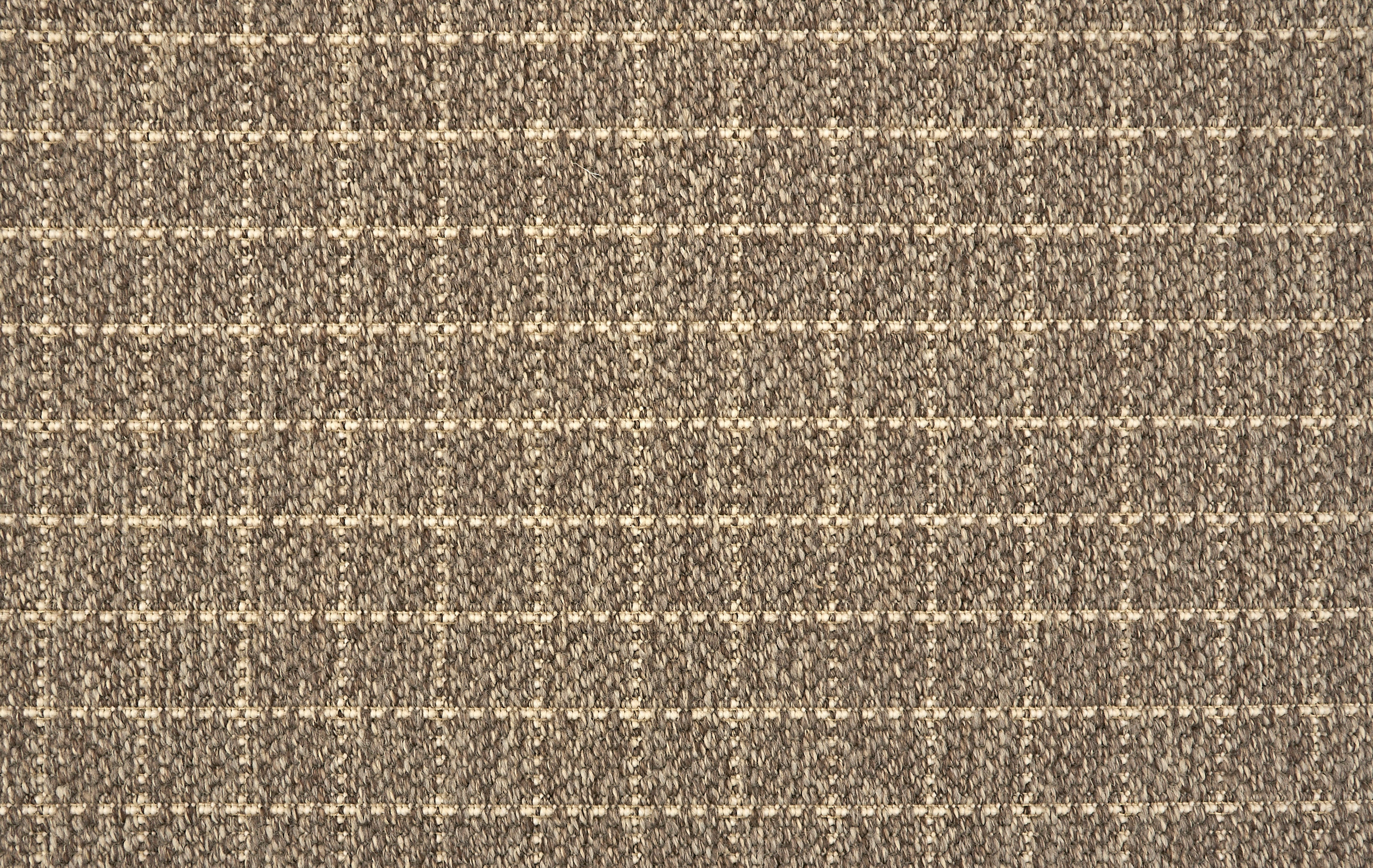 Broadloom carpet with windowpane pattern in brown. 