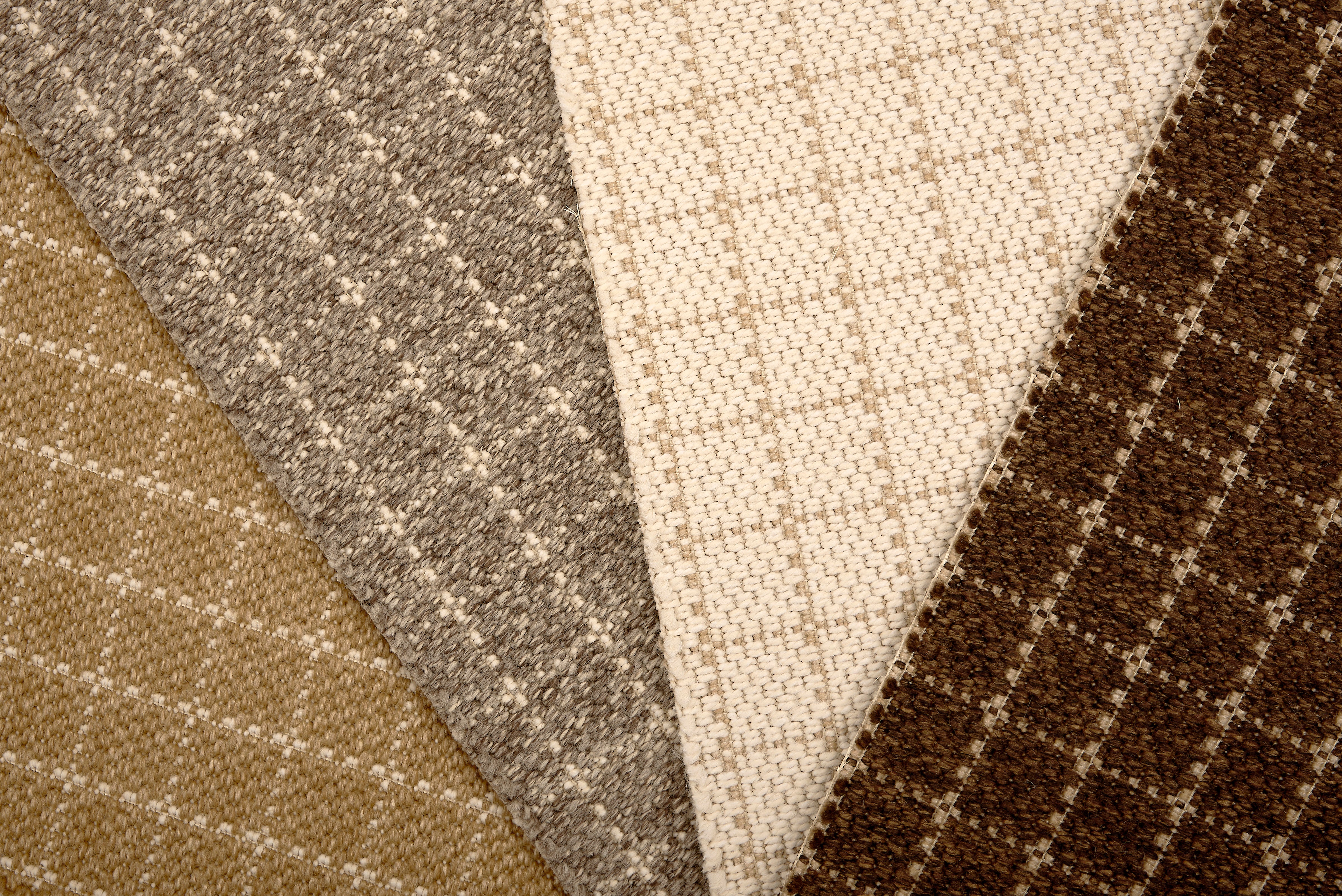 Broadloom carpet with windowpane check pattern in neutral colors. 