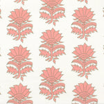 Detail of fabric in a repeating thistle print in pink and green on a white field.