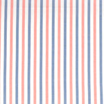 Detail of fabric in a small-scale stripe print in pink and blue on a white field.