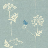 Detail of fabric in a playful flower and butterfly print in cream and blue on a light blue field.