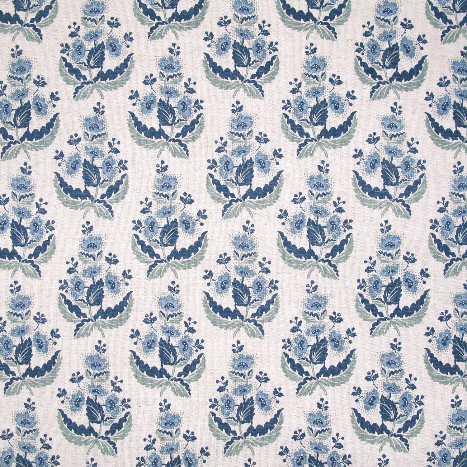 Patterned fabric with blue floral design on a white background